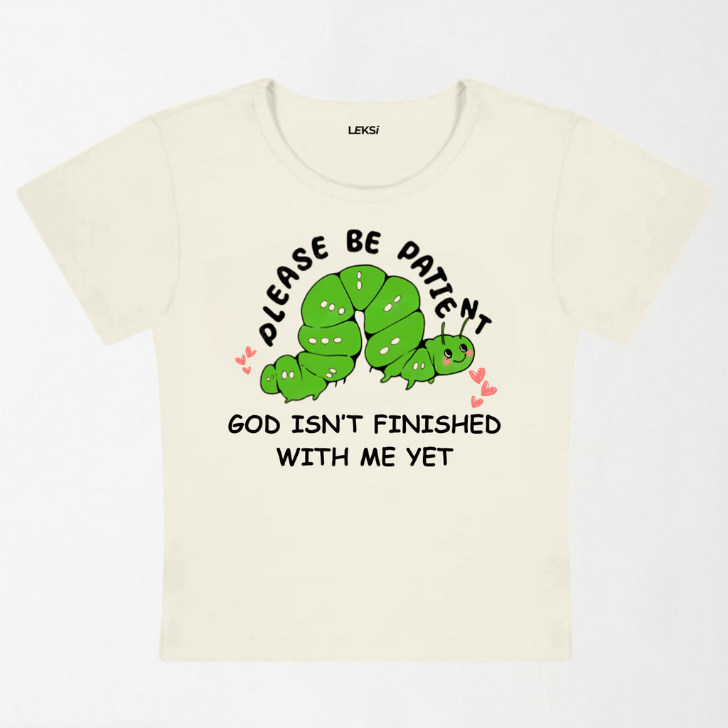 God Isn't Finished With Me Y2K Baby Tee XXS - Premium Unisex | LEKSI Pakistan
